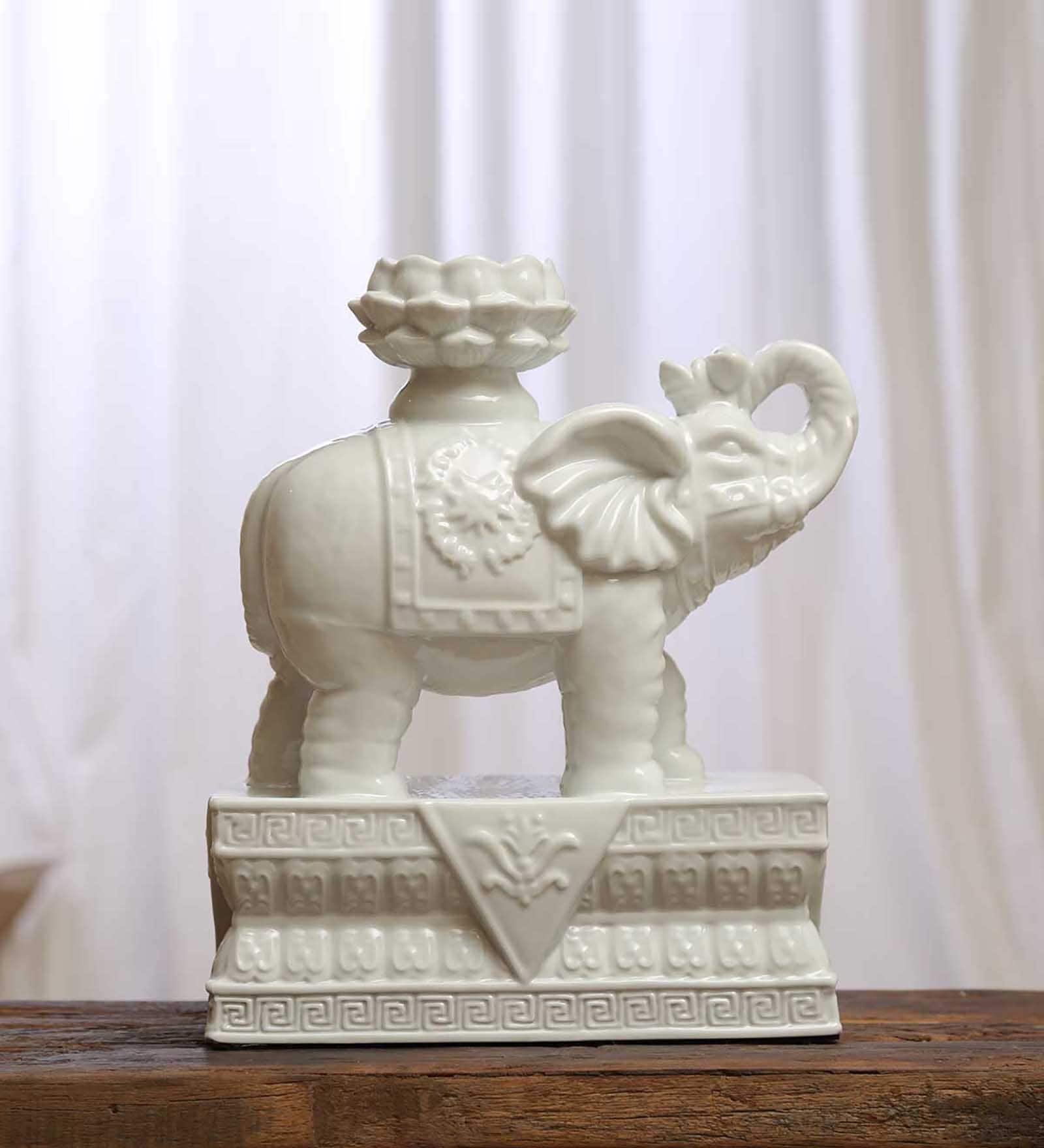 Trumping Elephant White Porcelain Figurine